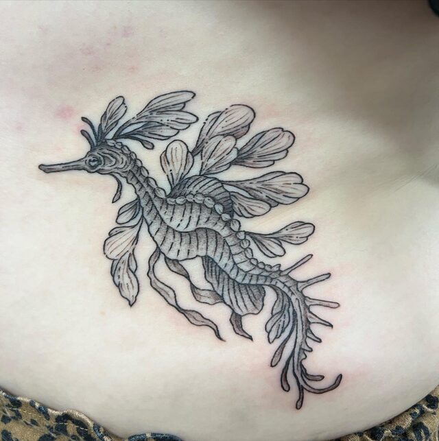 Fine-line tattoo of a leafy sea dragon with leaf-shaped fins